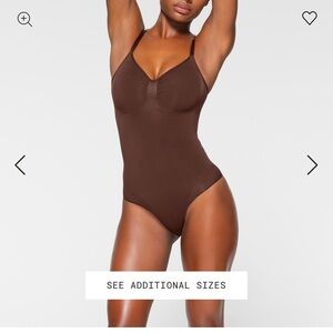 Skims brief bodysuit size small/medium